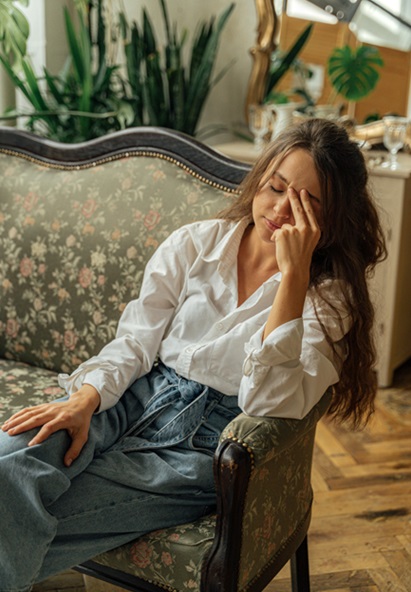 Picture of woman sitting on couch